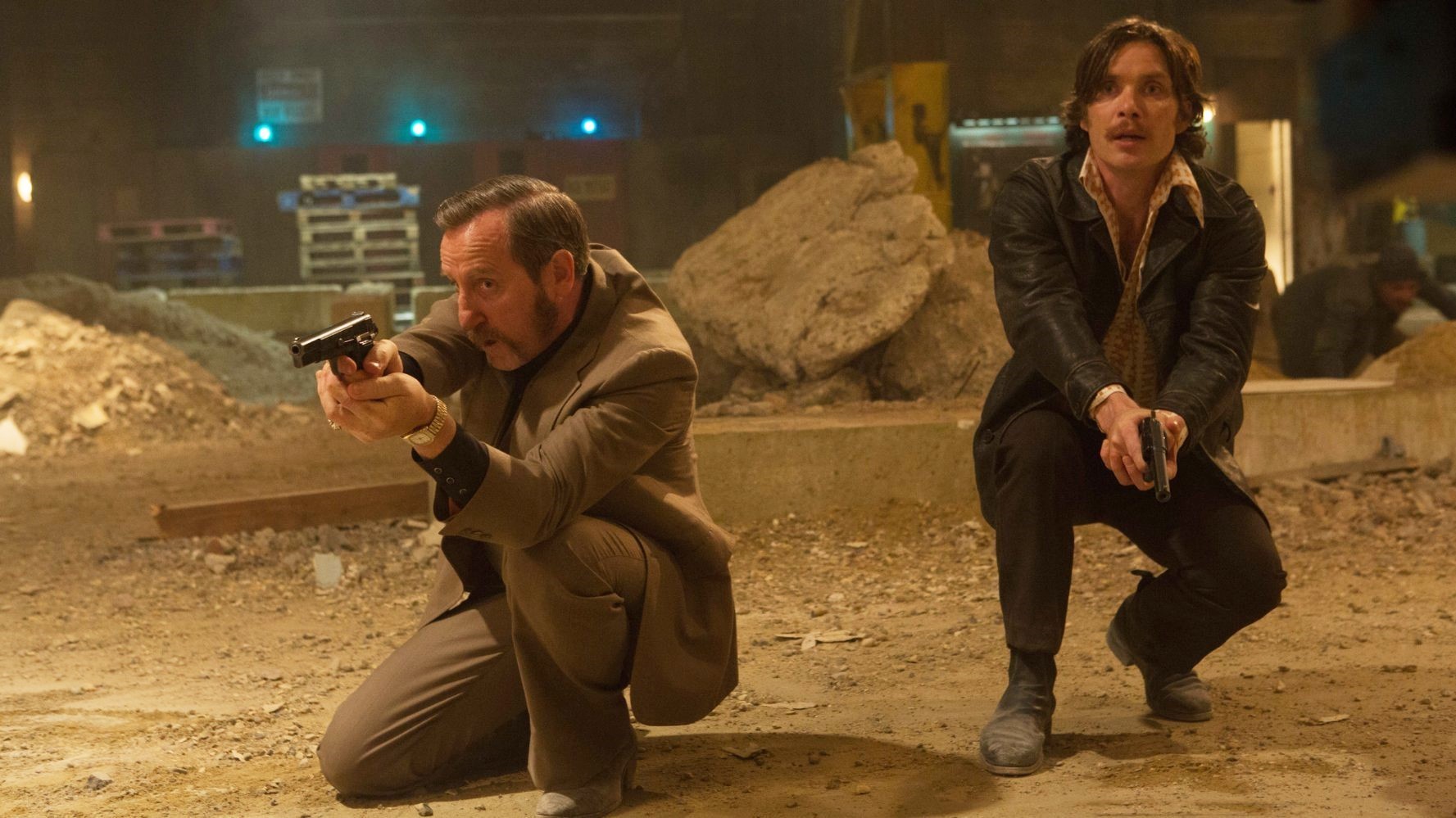 Michael Smiley stars as Frank and Cillian Murphy stars as Chris in A24's Free Fire (2017)