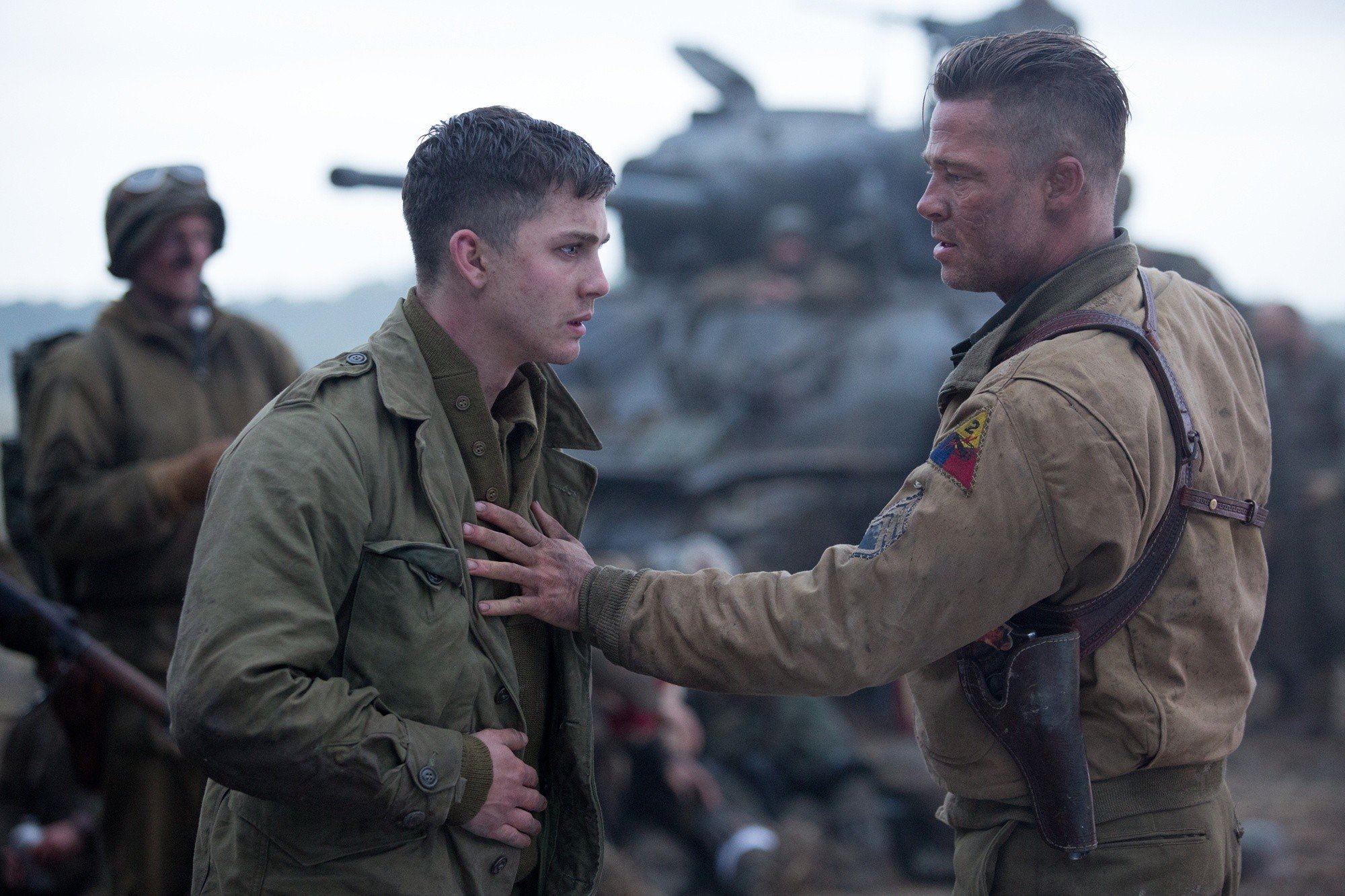 Logan Lerman stars as Norman Ellison and Brad Pitt stars as Wardaddy in Columbia Pictures' Fury (2014)