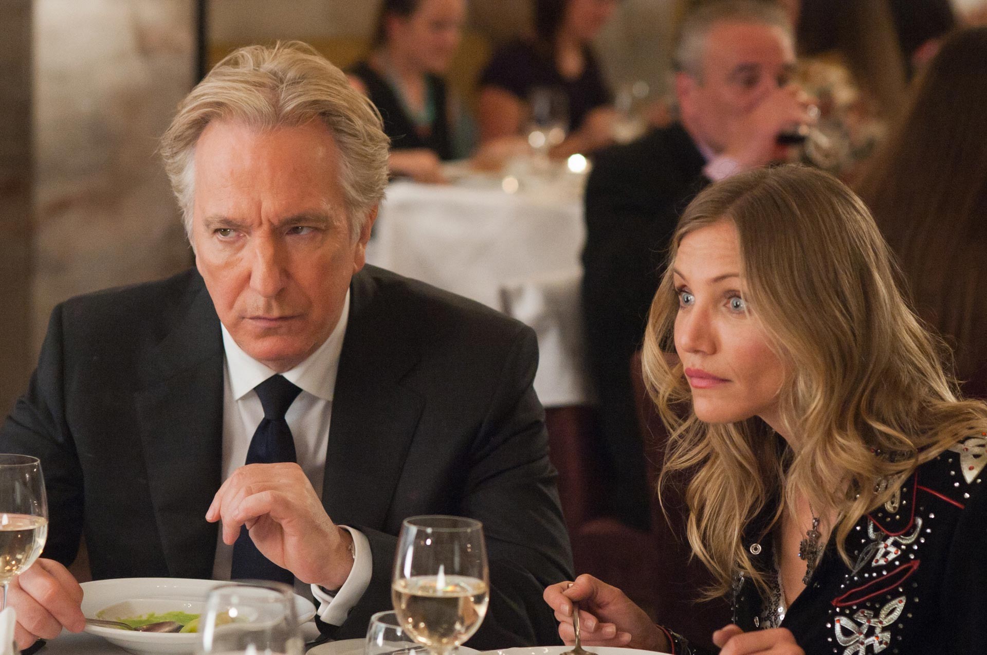 Alan Rickman stars as Lionel Shahbandar and Cameron Diaz stars as PJ Puznowski in CBS Films' Gambit (2014)