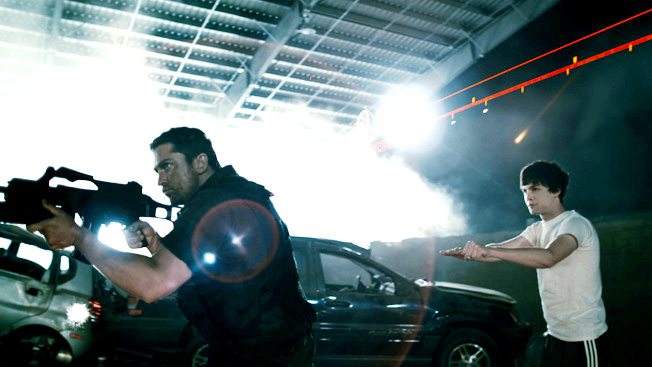Gerard Butler stars as Kable and Logan Lerman stars as Simon in Lionsgate Films' Gamer (2009)