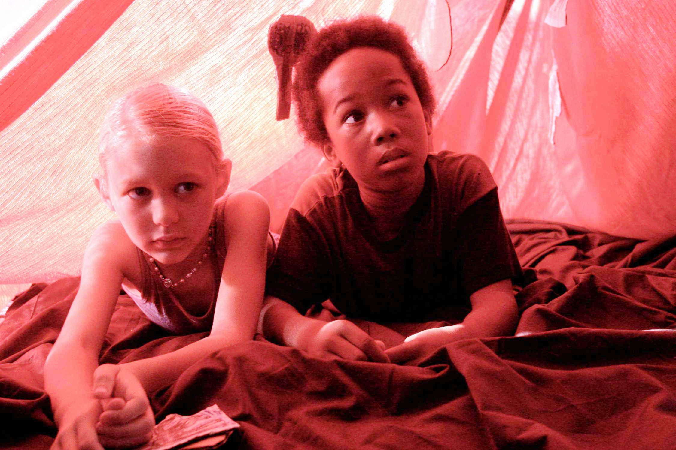Ryan Simpkins stars as Young Leslie and Jermaine Scooter Smith stars as Young Donnie in City Lights Pictures' Gardens of the Night (2008)