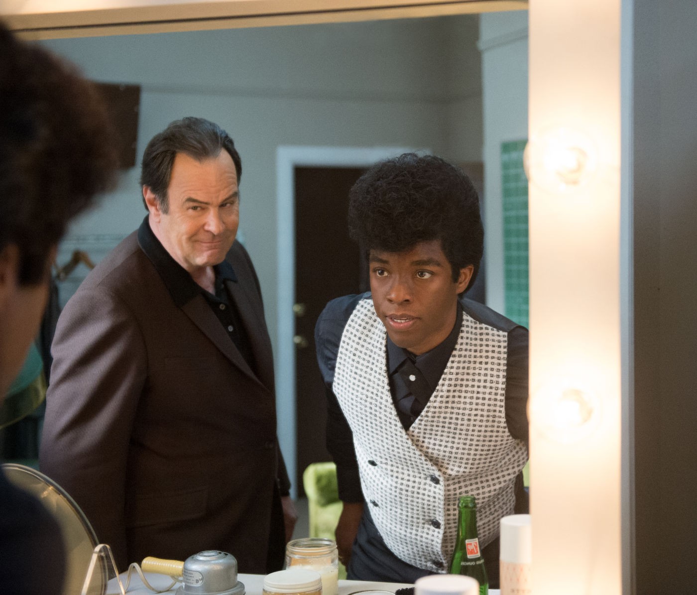 Dan Aykroyd stars as Ben Bart and Chadwick Boseman stars as James Brown in Universal Pictures' Get on Up (2014)