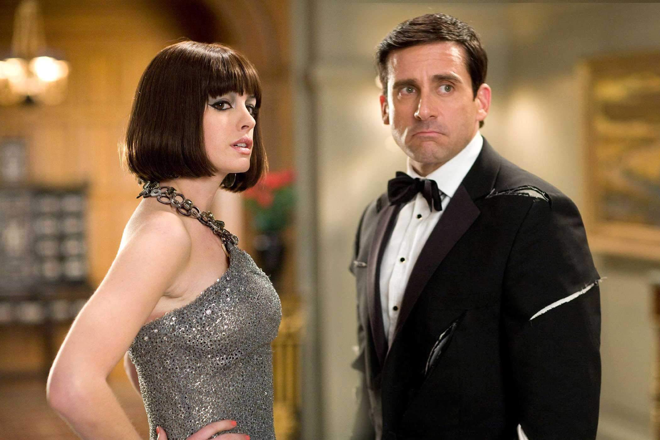 Anne Hathaway as Agent 99 and Steve Carell stars as Maxwell Smart in Warner Bros Pictures' Get Smart (2008). Photo by Tracy Bennett.