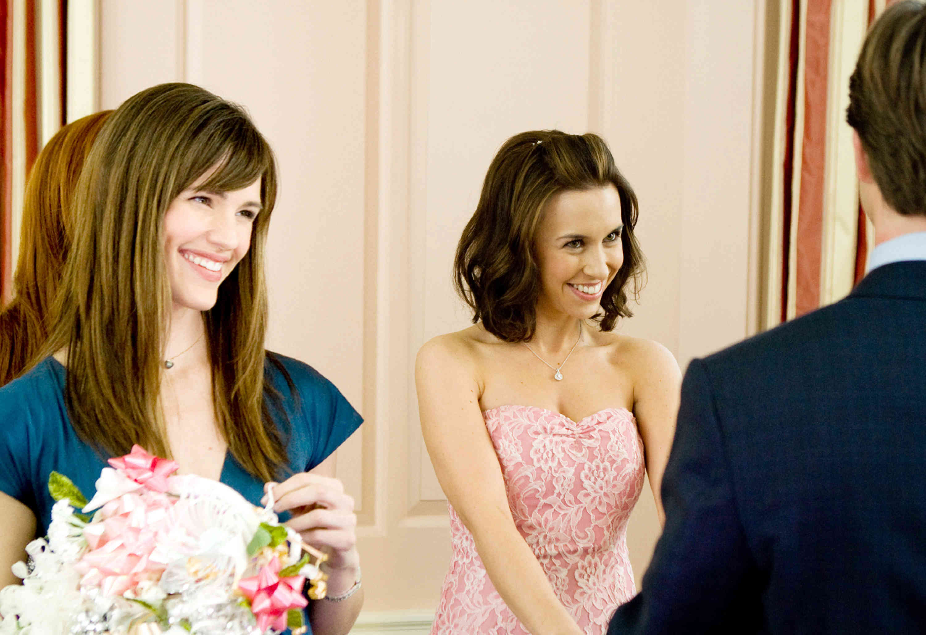 Jennifer Garner stars as Jenny and Lacey Chabert stars as Sandra in New Line Cinema's Ghosts of Girlfriends Past (2009)
