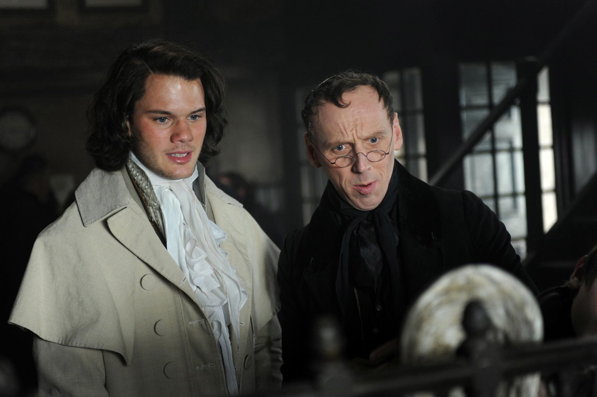 Jeremy Irvine stars as Pip and Ewen Bremner stars as Wemmick in Main Street Films' Great Expectations (2013)