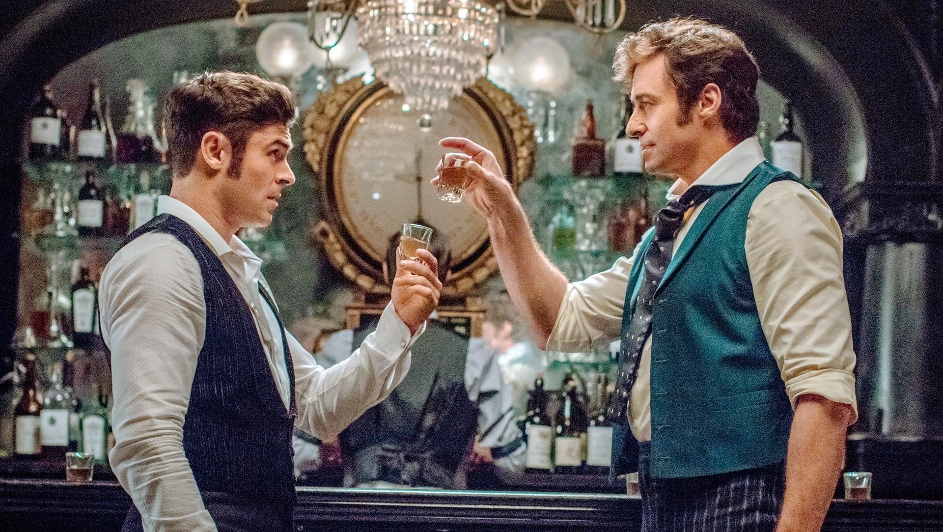 Zac Efron stars as Phillip and Hugh Jackman stars as P.T. Barnum in 20th Century Fox's The Greatest Showman (2017)