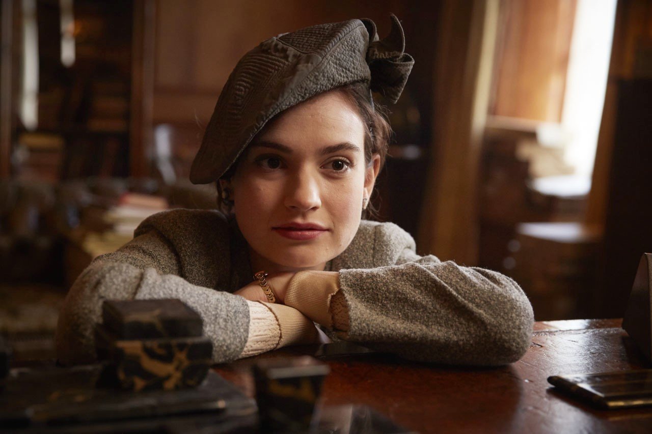 Lily James stars as Juliet Ashton in Netflix's The Guernsey Literary and Potato Peel Pie Society (2018)