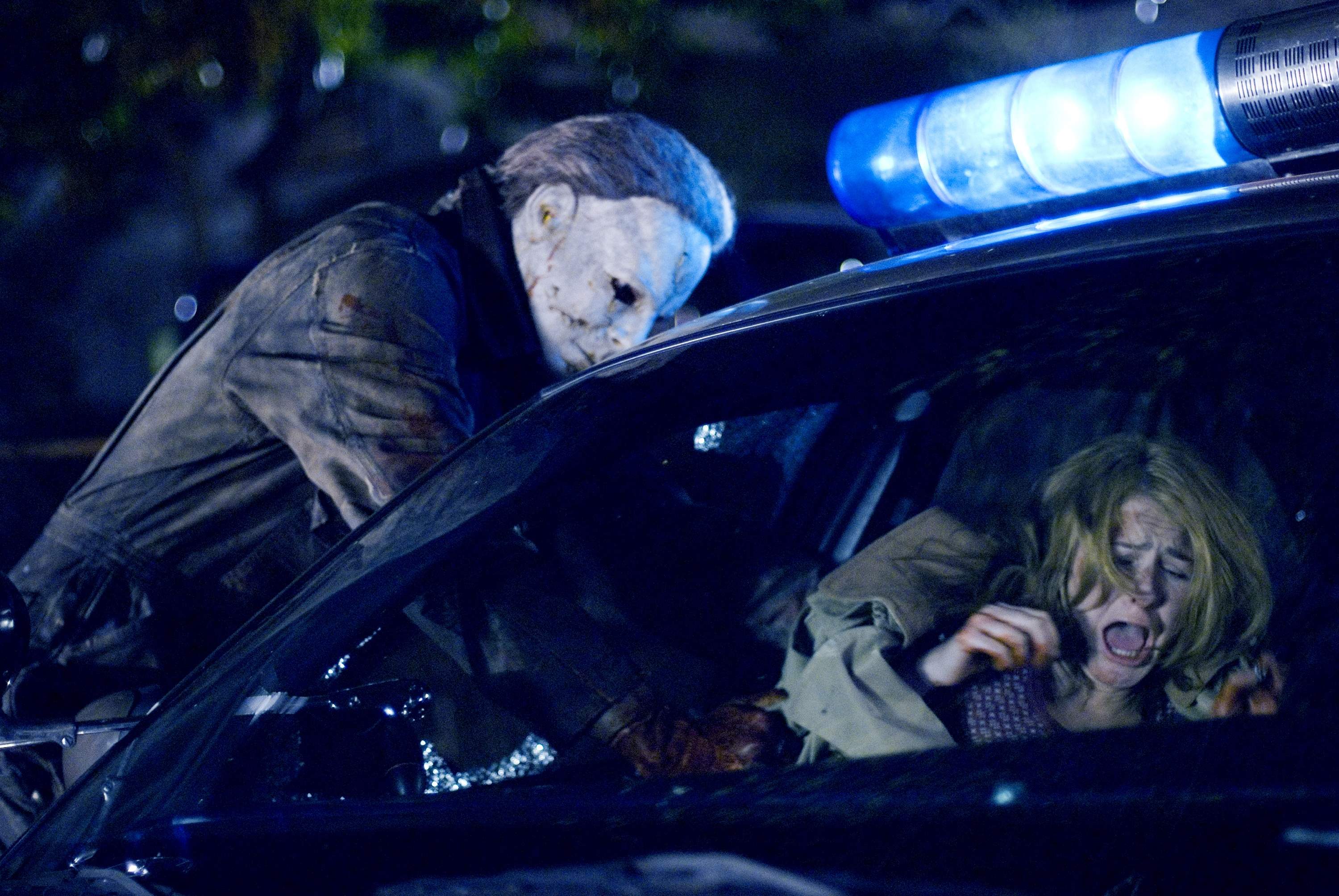 Tyler Mane as Michael Myers and Scout Taylor-Compton as Laurie Strode in MGM/Dimension Films' Halloween (2007)