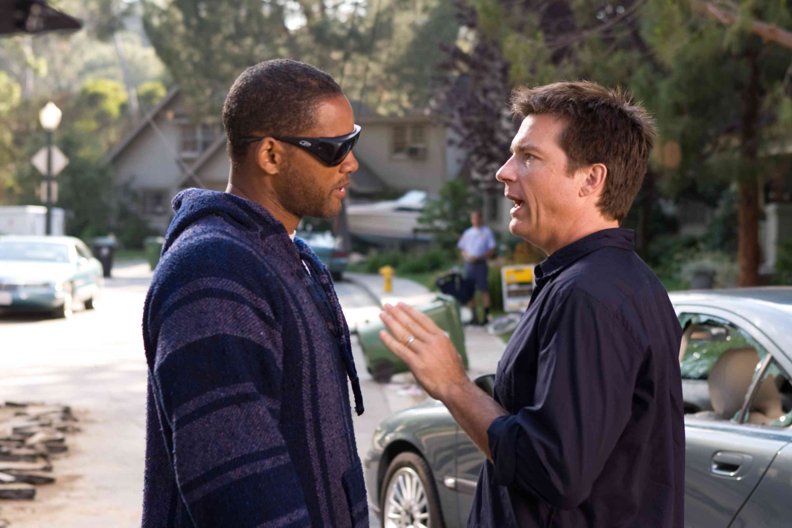 When disgruntled superhero Hancock (Will Smith, left) saves the life of PR exec Ray Embrey (Jason Bateman, right), Ray tries to clean up Hancock. Photo credit: Frank Masi SMPSP.