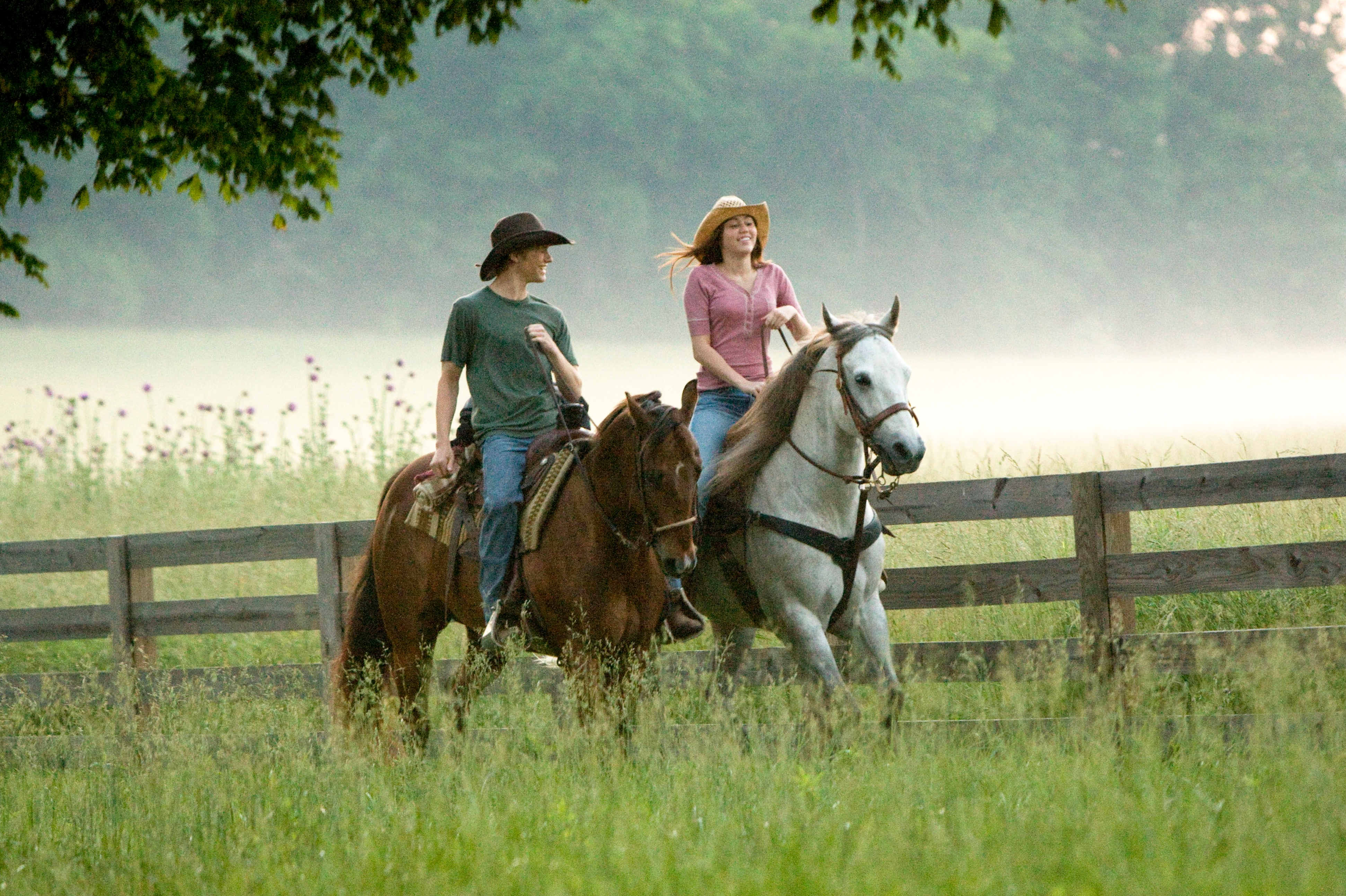 Lucas Till stars as Travis Brody and Miley Cyrus stars as Hannah Montana / Miley Stewart in Walt Disney Pictures' Hannah Montana: The Movie (2009). Photo credit by Sam Emerson.