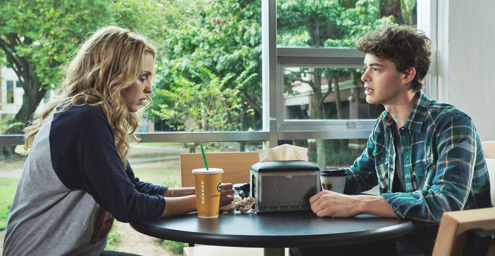 Jessica Rothe stars as Tree Gelbman and Israel Broussard stars as Carter Davis in Universal Pictures' Happy Death Day (2017)
