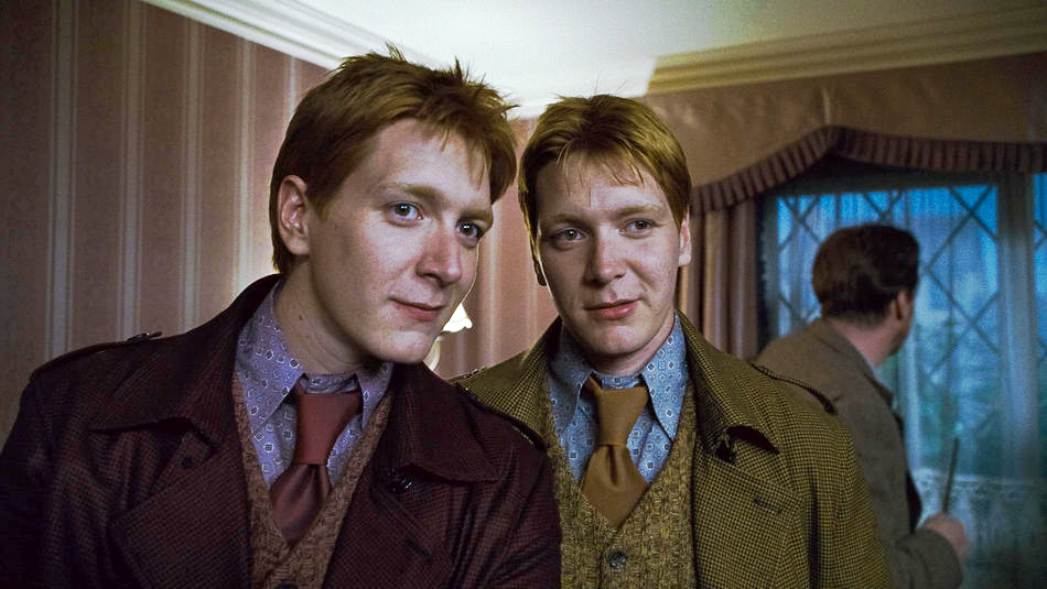 James Phelps stars as Fred Weasley and Oliver Phelps stars as George Weasley in Warner Bros. Pictures' Harry Potter and the Deathly Hallows: Part I (2010)