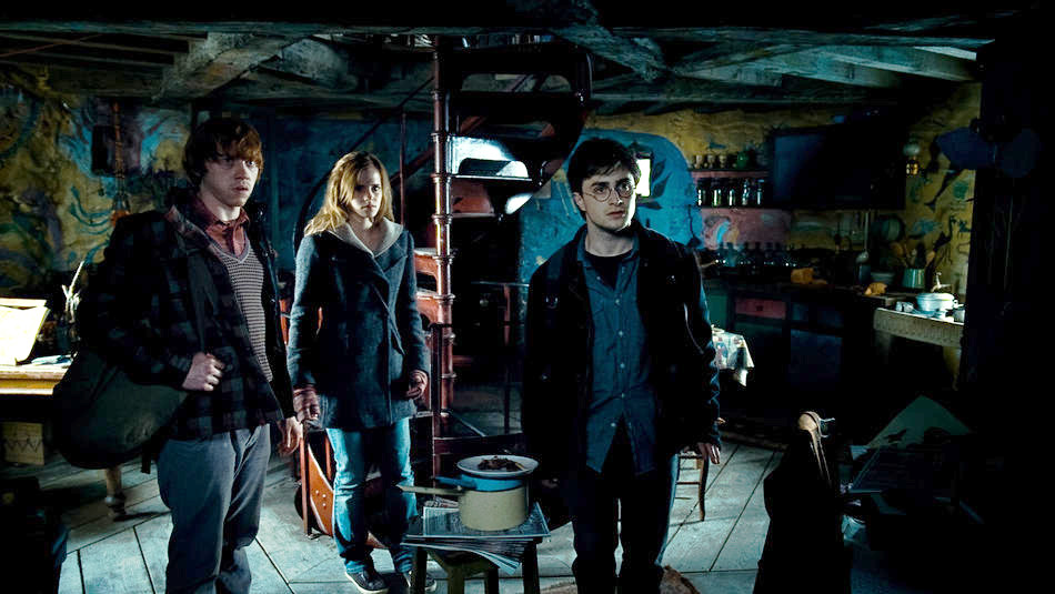 Rupert Grint, Emma Watson and Daniel Radcliffe in Warner Bros. Pictures' Harry Potter and the Deathly Hallows: Part I (2010)