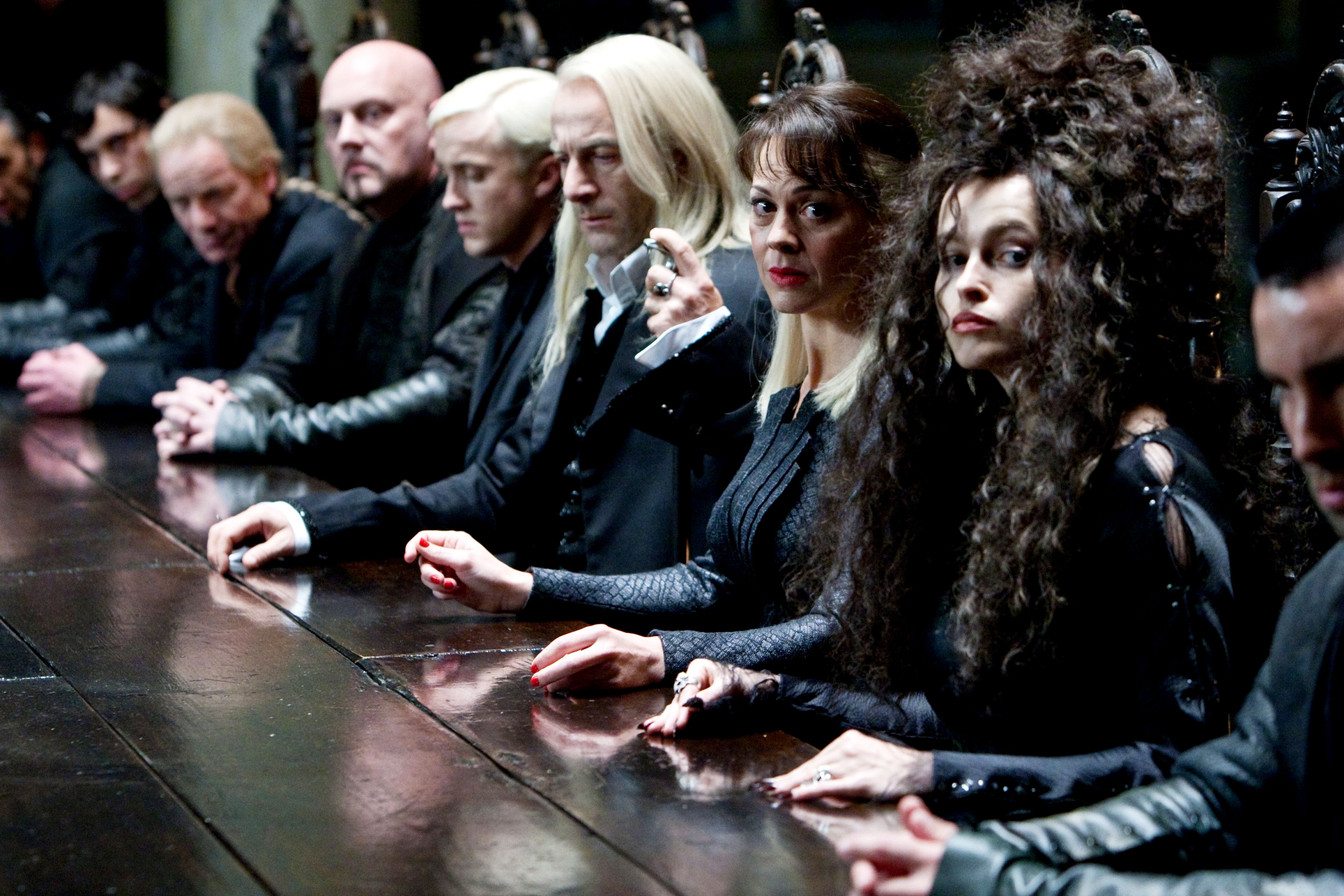 Tom Felton, Jason Isaacs, Helen McCrory and Helena Bonham Carter in Warner Bros. Pictures' Harry Potter and the Deathly Hallows: Part I (2010)