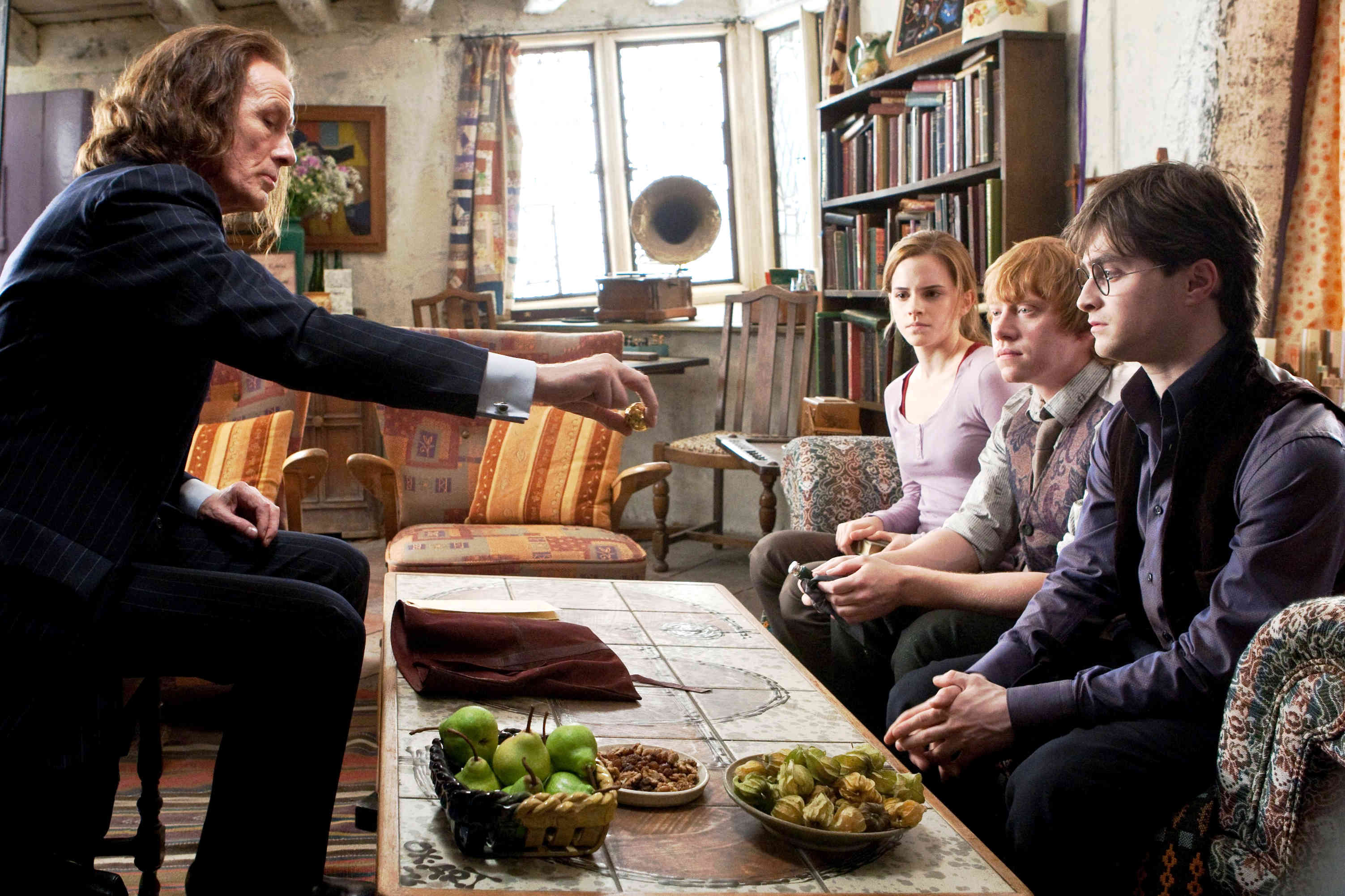 Bill Nighy, Daniel Radcliffe, Rupert Grint and Emma Watson in Warner Bros. Pictures' Harry Potter and the Deathly Hallows: Part I (2010)