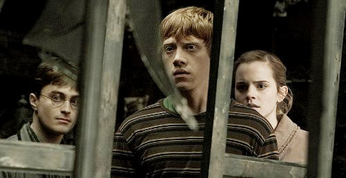 Rupert Grint, Daniel Radcliffe and Emma Watson in Warner Bros. Pictures' Harry Potter and the Deathly Hallows: Part I (2010)
