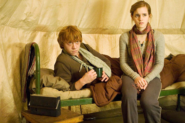 Rupert Grint stars as Ron Weasley and Emma Watson stars as Hermione Granger in Warner Bros. Pictures' Harry Potter and the Deathly Hallows: Part I (2010)