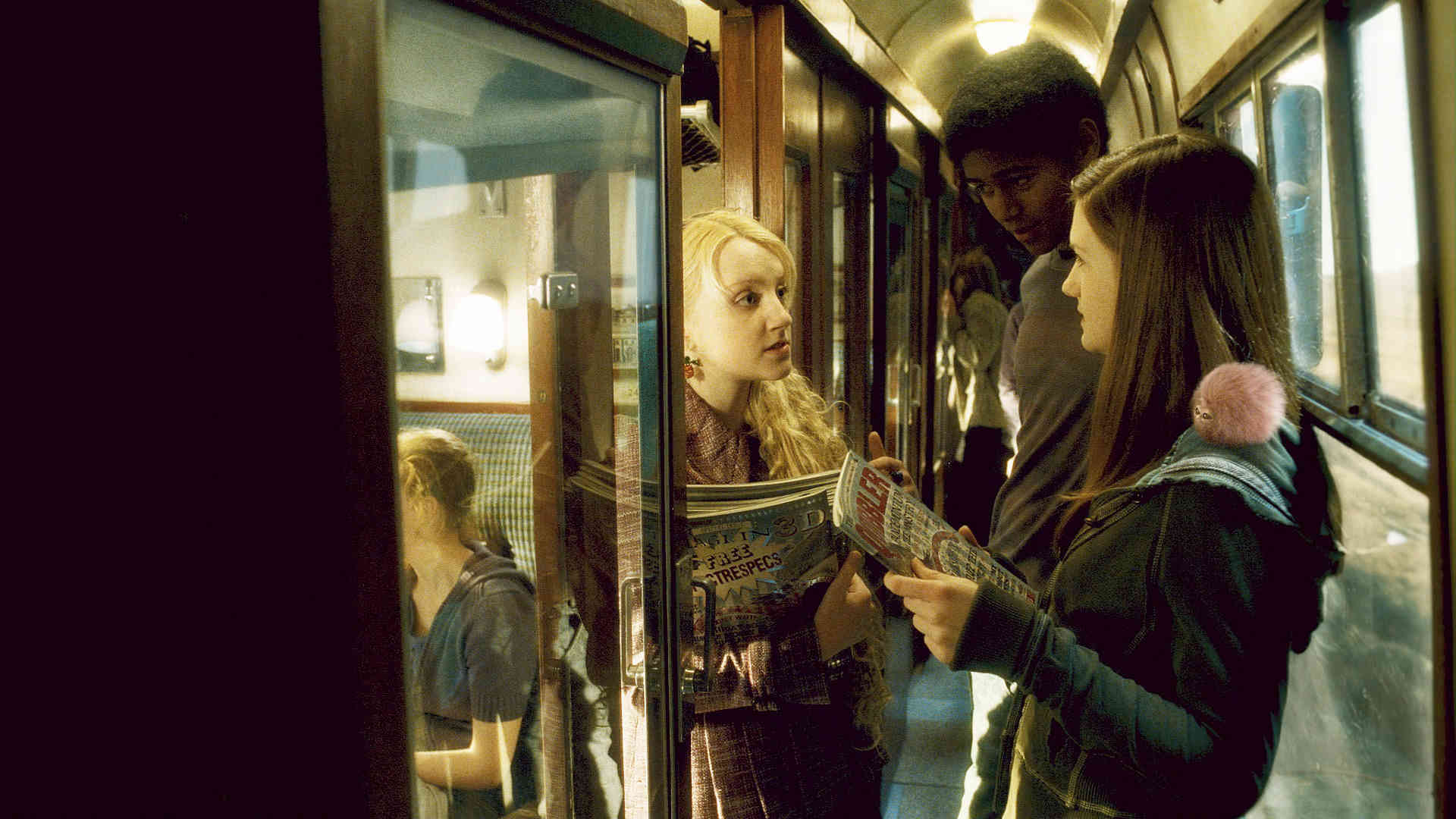 Evanna Lynch stars as Luna Lovegood and Bonnie Wright stars as Ginny Weasley in Warner Bros Pictures' Harry Potter and the Half-Blood Prince (2009)