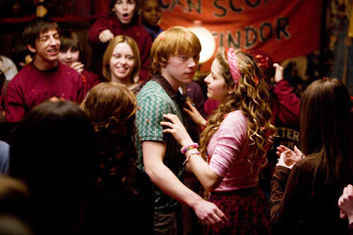 Rupert Grint stars as Ron Weasley and Jessie Cave stars as Lavender Brown in Warner Bros Pictures' Harry Potter and the Half-Blood Prince (2009)
