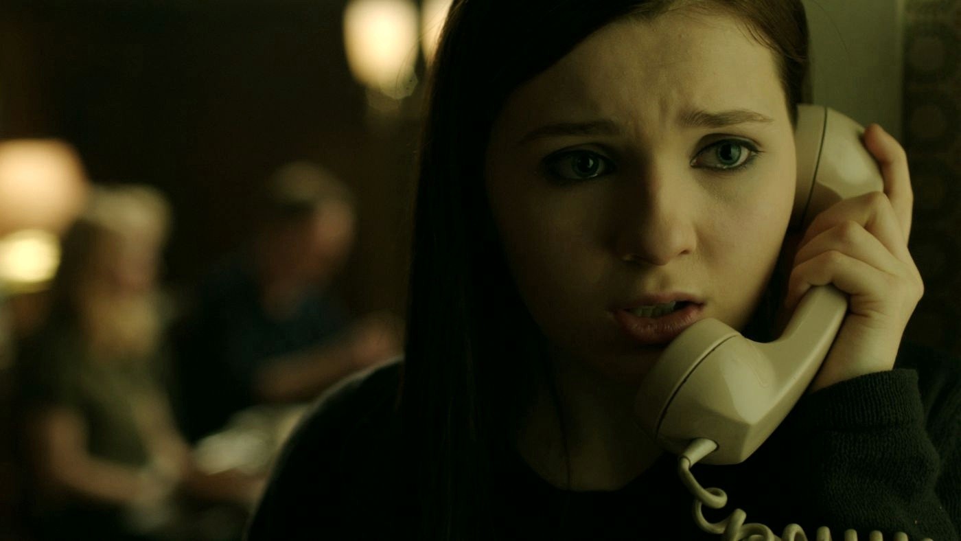 Abigail Breslin stars as Lisa in IFC Midnight's Haunter (2014)