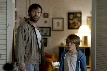 Rain Willson stars as Paul Forney and Devin Brochu stars as T.J. in Newmarket Films' Hesher (2011)