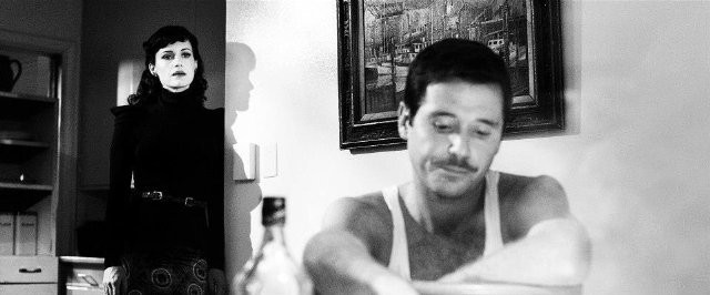 Carla Gugino stars as Hanna Click and Kevin Connolly stars as Vance in Gato Negro Films' Hotel Noir (2012)