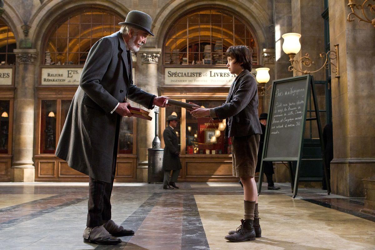 Christopher Lee stars as Monsieur Labisseqq and Asa Butterfield stars as Hugo Cabret in Paramount Pictures' Hugo (2011)