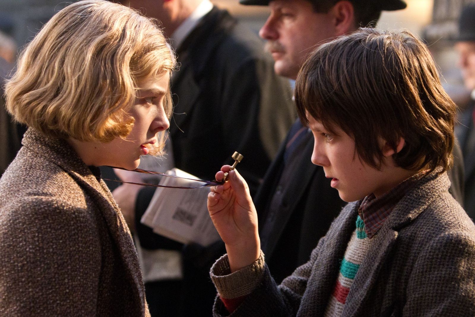 Chloe Moretz stars as Isabelle and Asa Butterfield stars as Hugo Cabret in Paramount Pictures' Hugo (2011)