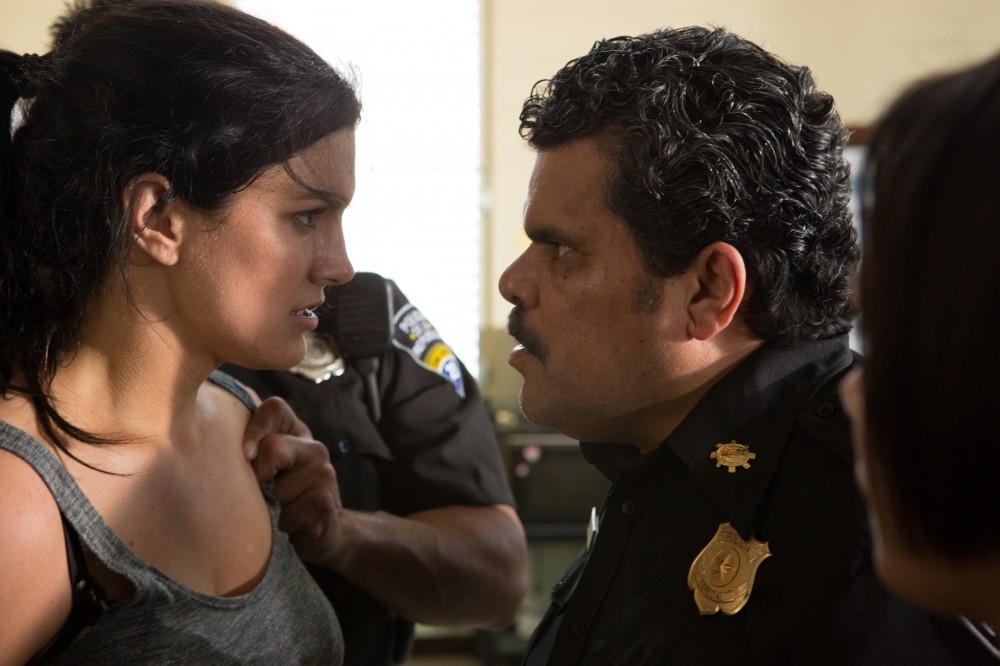Gina Carano stars as Ava and Luis Guzman 	stars as Chief Ramon Garza in Anchor Bay Films' In the Blood (2014)