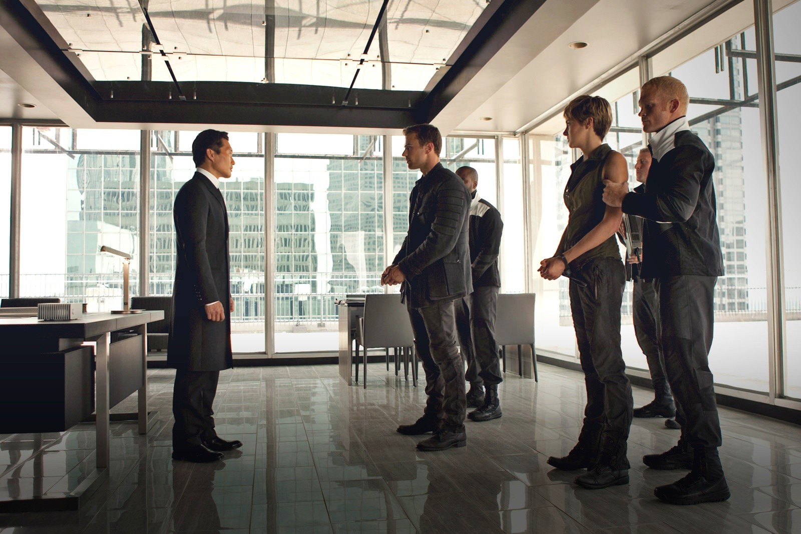 Daniel Dae Kim, Theo James and Shailene Woodley in Summit Entertainment's The Divergent Series: Insurgent (2015). Photo credit by Andrew Cooper.