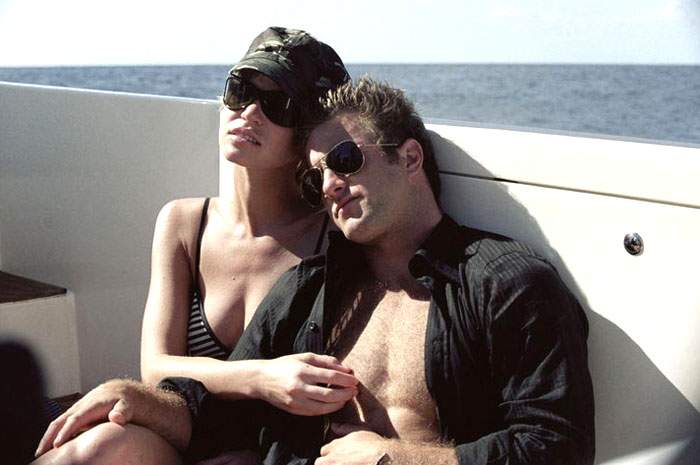 Ashley Scott and Scott Caan in MGM's Into the Blue (2005)