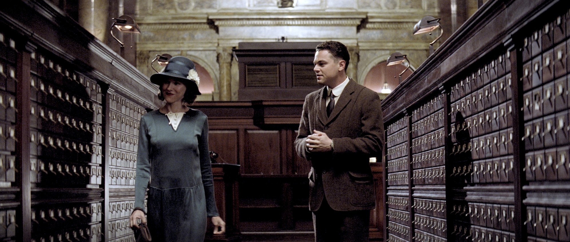 Naomi Watts stars as Helen Gandy and Leonardo DiCaprio stars as J. Edgar Hoover in Warner Bros. Pictures' J. Edgar (2011)