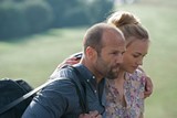 Jason Statham stars as Danny Bryce and Yvonne Strahovski stars as Anne in Open Road Films' Killer Elite (2011)