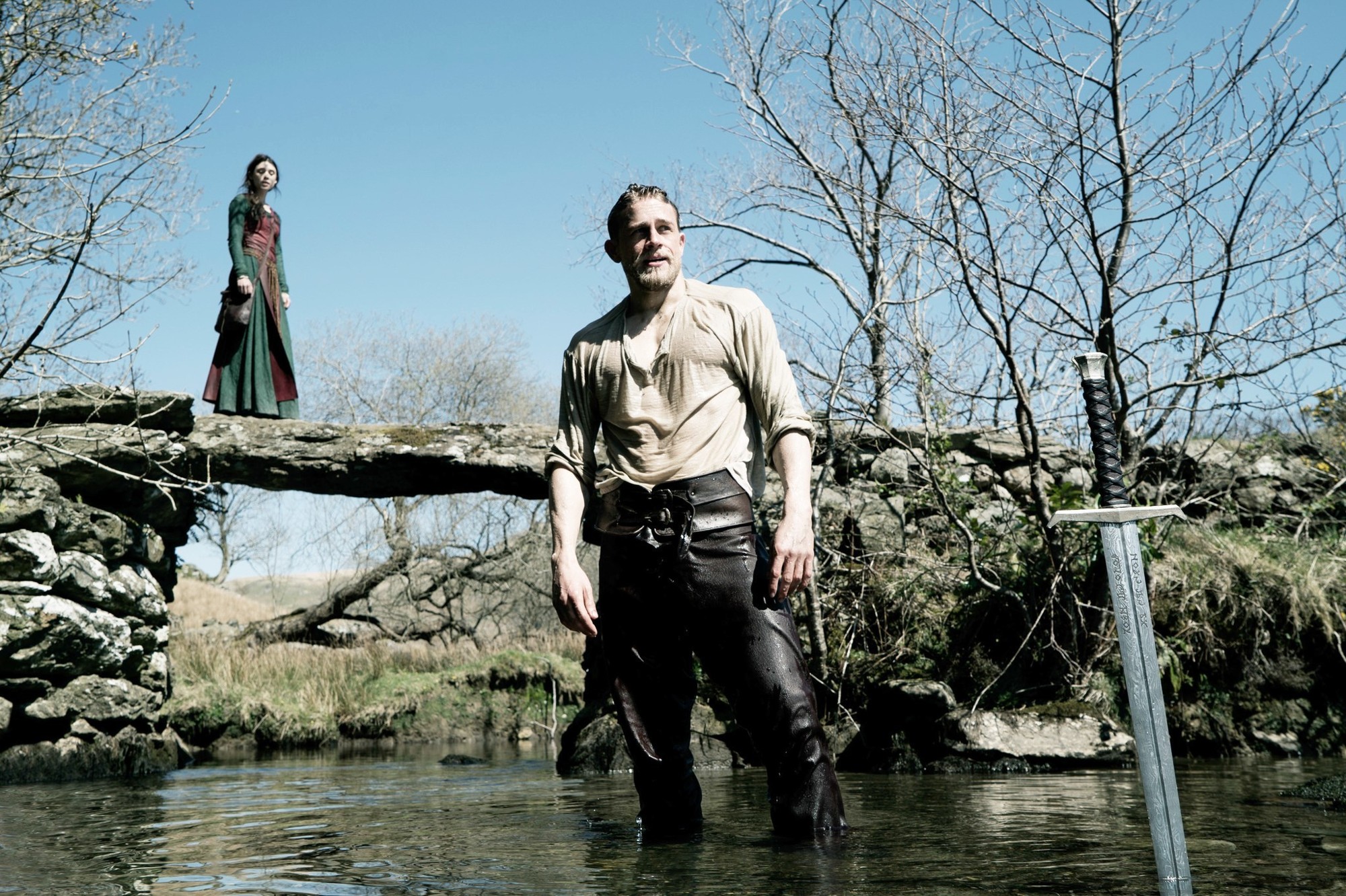 Astrid Berges-Frisbey stars as The Mage and Charlie Hunnam stars as King Arthur in Warner Bros. Pictures' King Arthur: Legend of the Sword (2017)