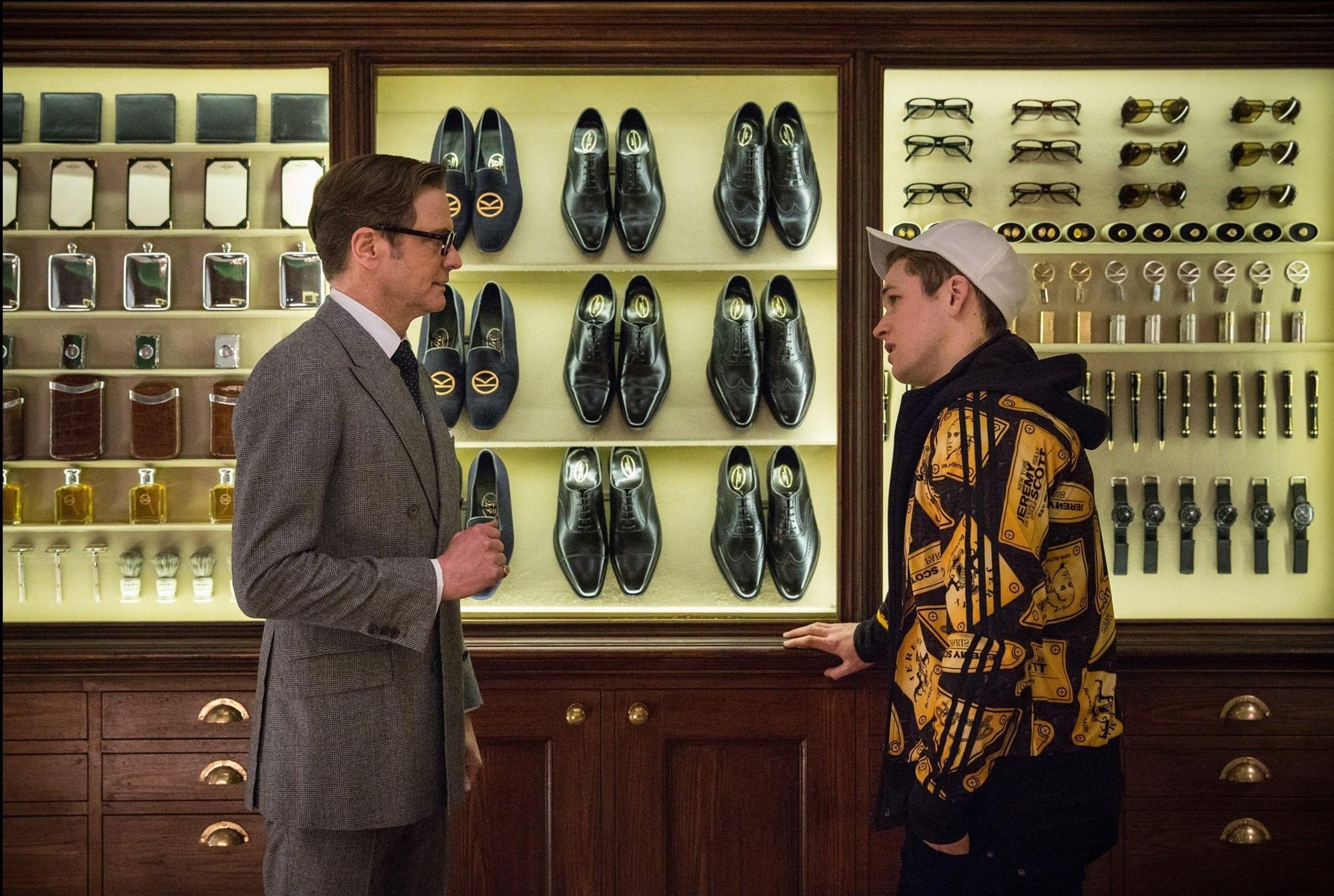 Colin Firth stars as Harry Hart/Galahad and Taron Egerton stars as Gary Unwin in 20th Century Fox's Kingsman: The Secret Service (2015)