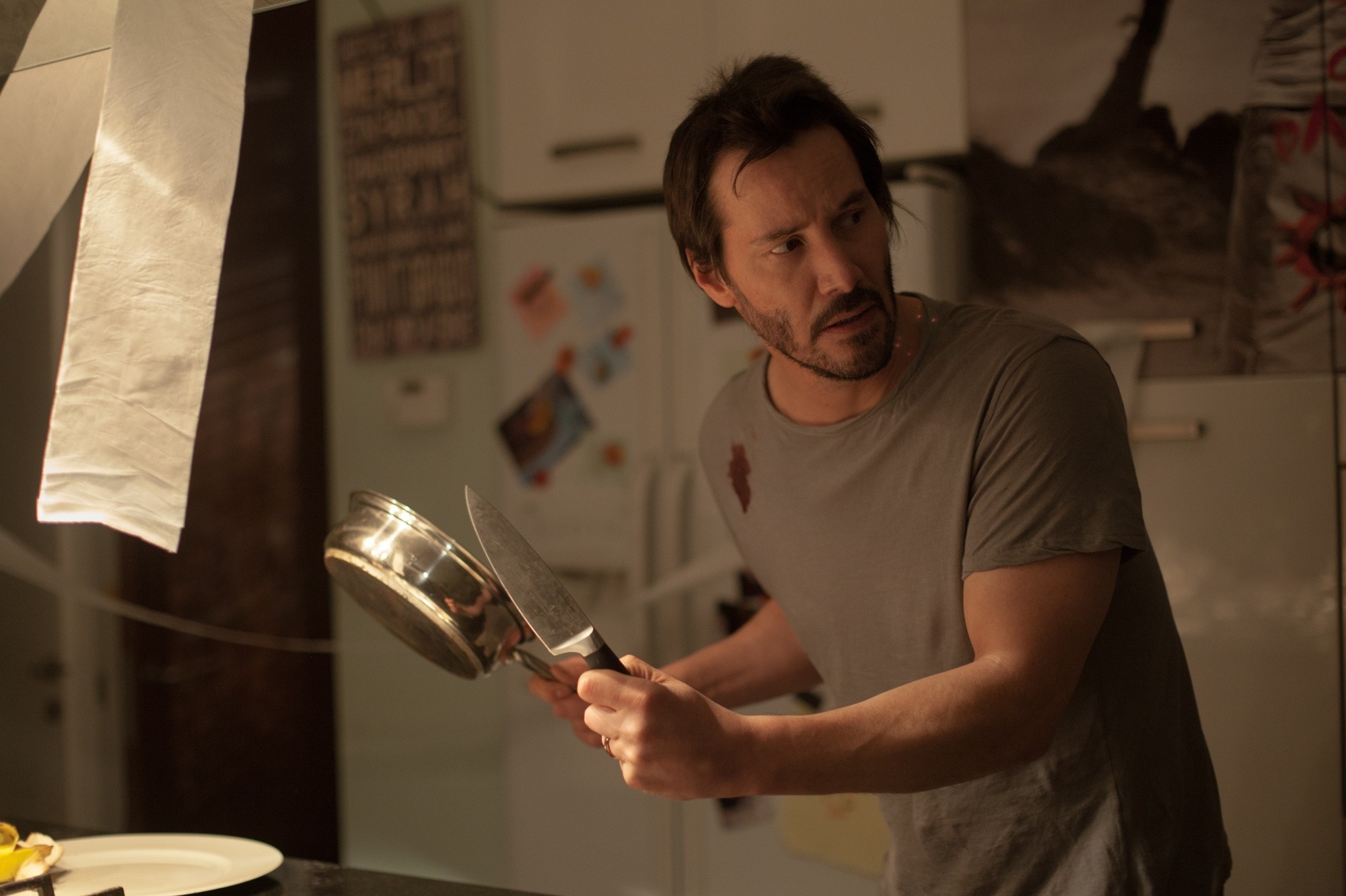 Keanu Reeves stars as Evan Webber in Lionsgate Films' Knock Knock (2015)