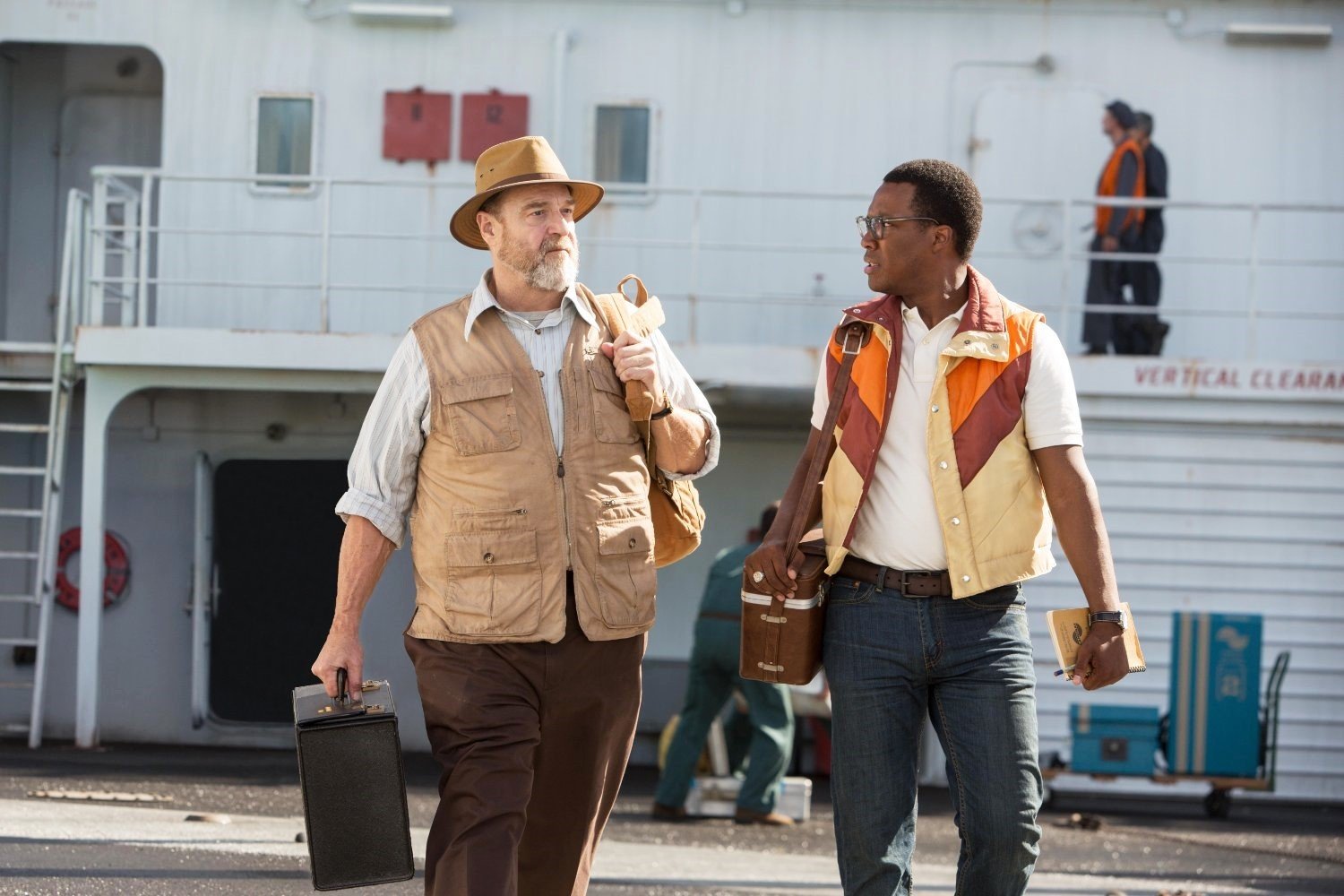 John Goodman stars as Bill Randa and Corey Hawkins stars as Houston Brooks in Warner Bros. Pictures' Kong: Skull Island (2017)