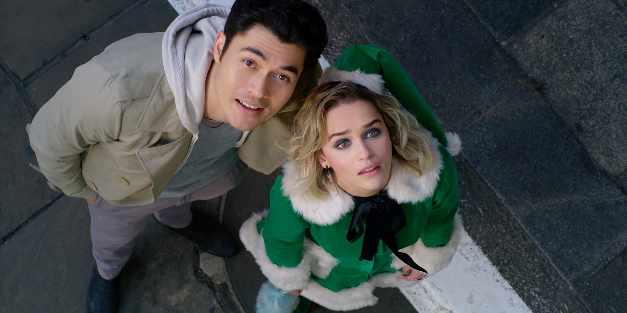Henry Golding stars as Tom and Emilia Clarke stars as Kate in Universal Pictures' Last Christmas (2019)