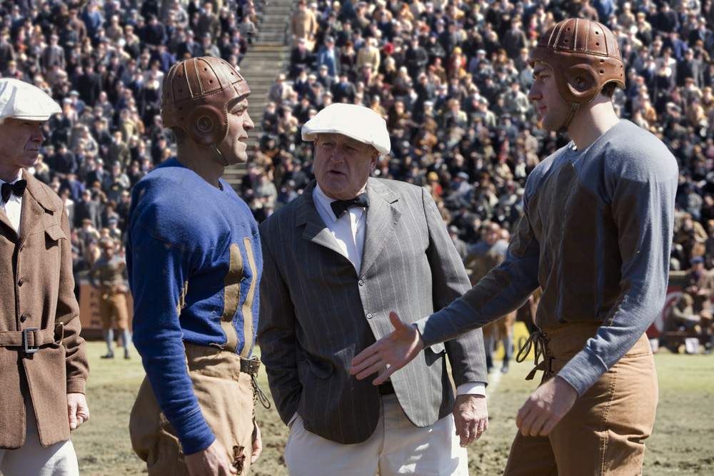 Bulldogs team captain Dodge Connolly (GEORGE CLOONEY), Chicago referee (BLAKE CLARK) and war hero Carter Rutherford (JOHN KRASINSKI) in Leatherheads.