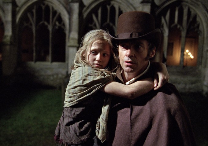 Isabelle Allen stars as Young Cosette and Hugh Jackman stars as Jean Valjean in Universal Pictures' Les Miserables (2012)