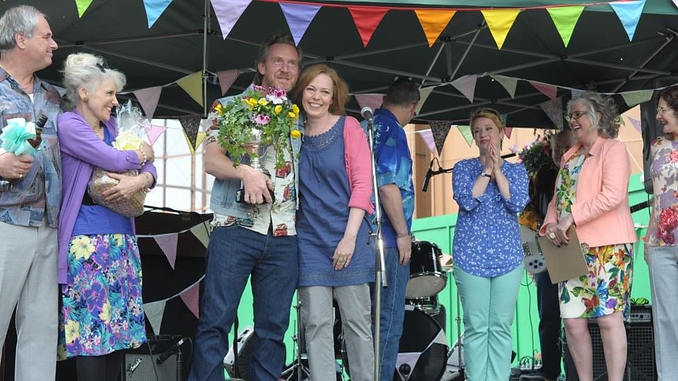 Paul Thornley stars as Dodge and Olivia Colman stars as Julie in BBC Worldwide North America' London Road (2016)
