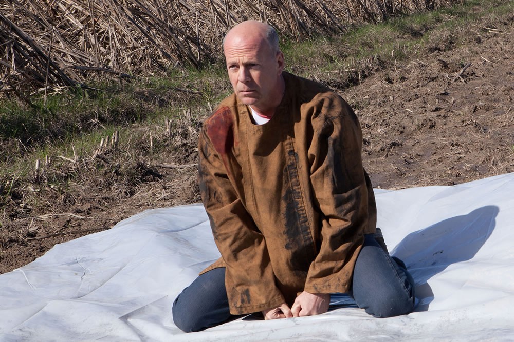 Bruce Willis stars as Older Joe in TriStar Pictures' Looper (2012)