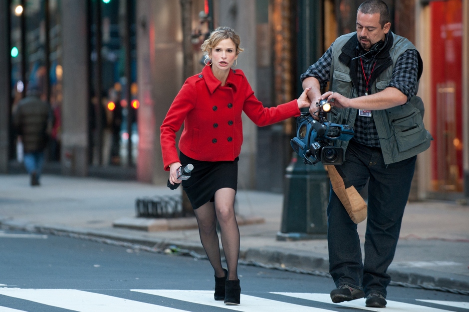 Kyra Sedgwick stars as Suzie Morales and Frank Pando stars as Cameraman in Summit Entertainment's Man on a Ledge (2012)