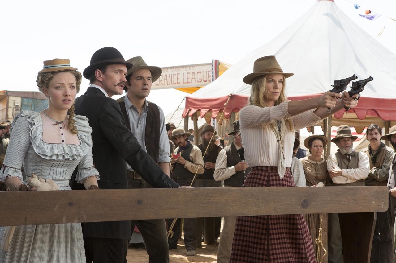 Amanda Seyfried, Neil Patrick Harris, Seth MacFarlane and Charlize Theron in Universal Pictures' A Million Ways to Die in the West (2014)