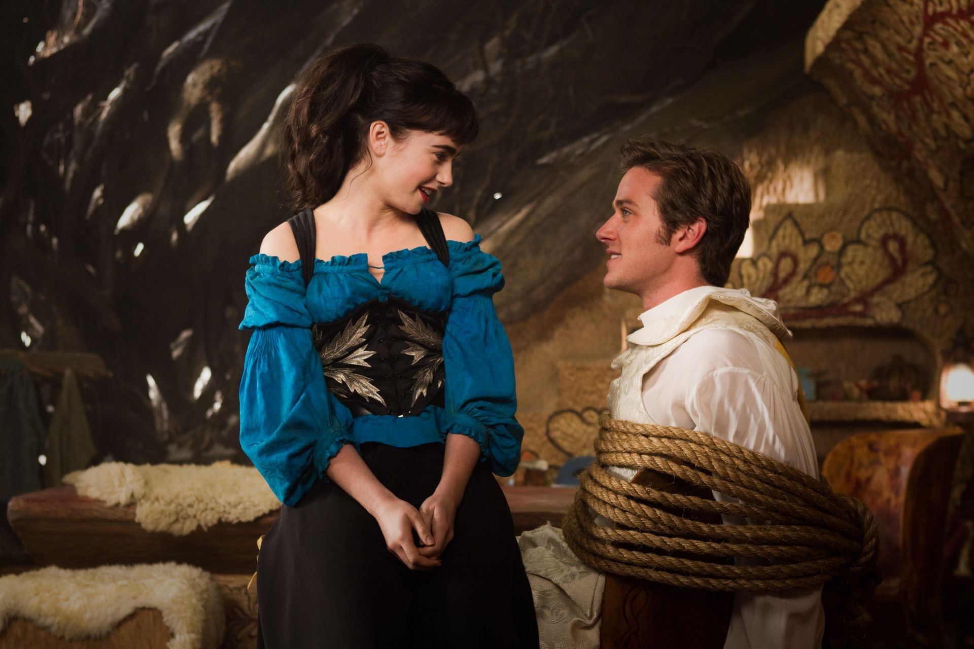 Lily Collins stars as Snow White and Armie Hammer stars as Prince Andrew Alcott in Relativity Media's Mirror Mirror (2012). Photo credit by Jan Thijs.