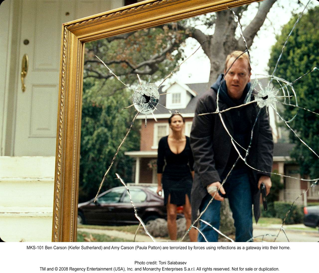Paula Patton stars as Amy Carson and Kiefer Sutherland stars as Ben Carson in The 20th Century Fox's Mirrors (2008). Photo credit by Toni Salabasev.