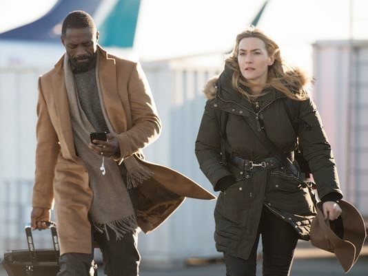 Idris Elba stars as Ben Bass and Kate Winslet stars as Alex Martin in 20th Century Fox's The Mountain Between Us (2017)