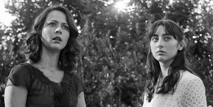 Amy Acker stars as Beatrice and Ashley Johnson stars as Margaret in Lionsgate Films' Much Ado About Nothing (2013)