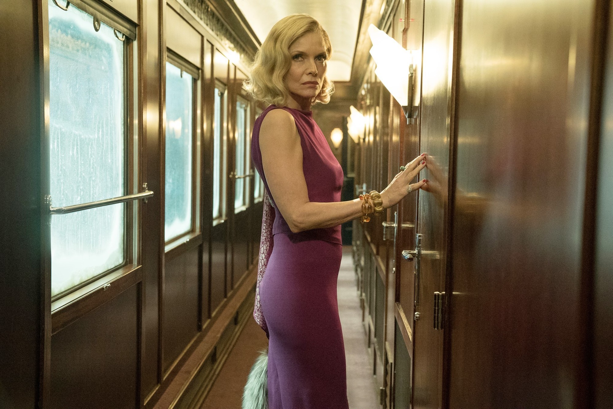 Michelle Pfeiffer stars as Mrs. Hubbard in 20th Century Fox's Murder on the Orient Express (2017)