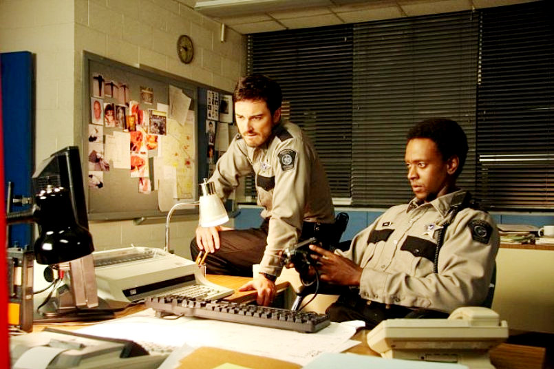 Kerr Smith stars as Axel Palmer and Edi Gathegi stars as Deputy Martin in Lionsgate Films' My Bloody Valentine 3-D (2009)